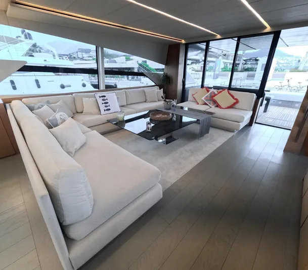  Yacht Photos Pics Luxurious interior of a 2012 Pershing 92 yacht with elegant seating and modern decor.