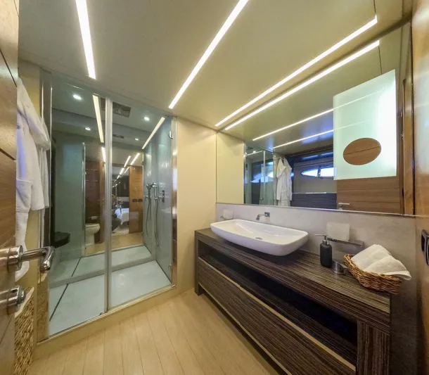  Yacht Photos Pics Luxurious bathroom interior on a 2012 Pershing 92 yacht, featuring modern fixtures and elegant design.