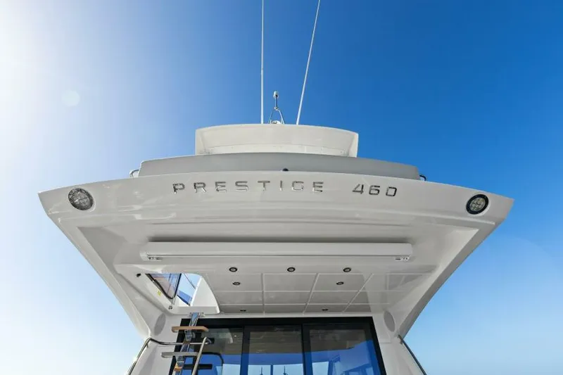Brace Yourself Too Yacht Photos Pics 2022 Prestige 460 yacht against clear blue sky, rear view.