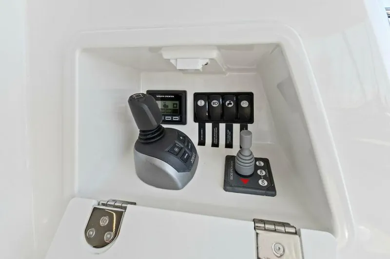 Brace Yourself Too Yacht Photos Pics Control panel of 2022 Prestige 460 yacht with joystick and switches.