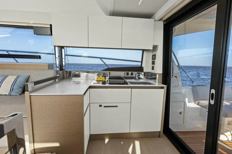 Brace Yourself Too Yacht Photos Pics Modern kitchen interior on 2022 Prestige 460 yacht with ocean view.