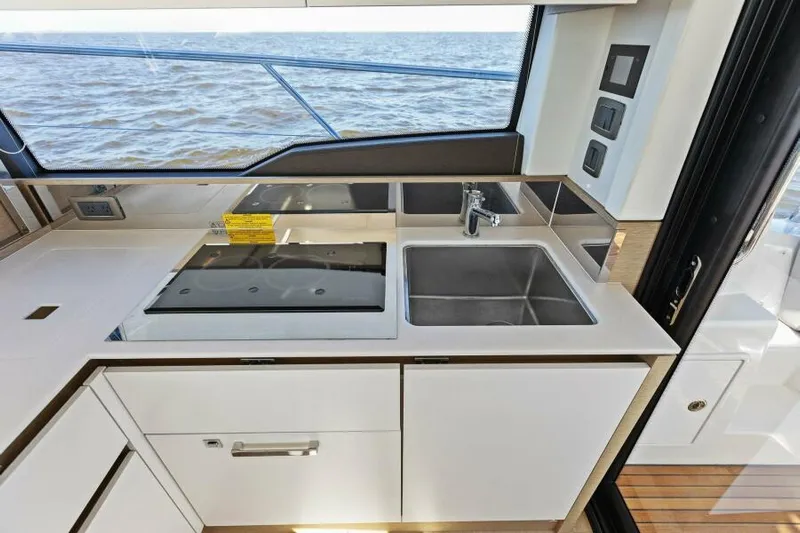 Brace Yourself Too Yacht Photos Pics Modern kitchen on 2022 Prestige 460 yacht with ocean view.