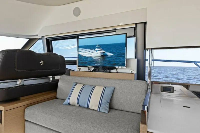 Brace Yourself Too Yacht Photos Pics Luxurious interior of 2022 Prestige 460 yacht with ocean view and TV.