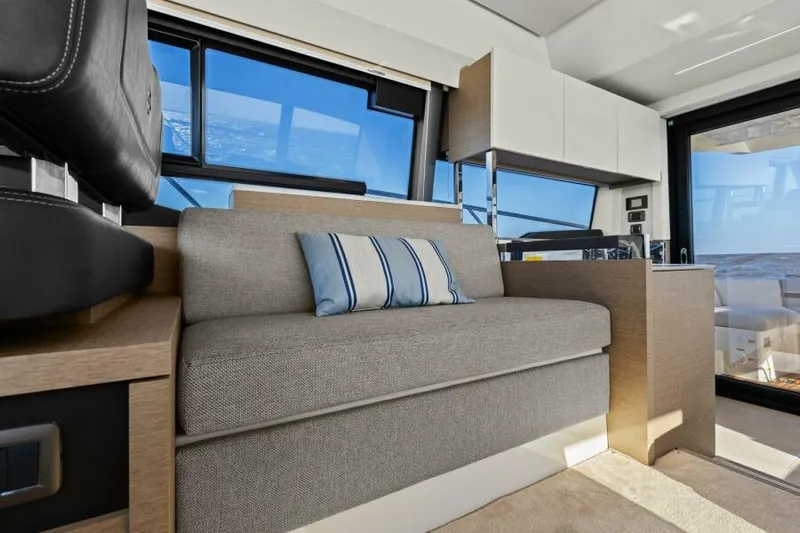 Brace Yourself Too Yacht Photos Pics Interior of 2022 Prestige 460 yacht with modern seating and ocean view.