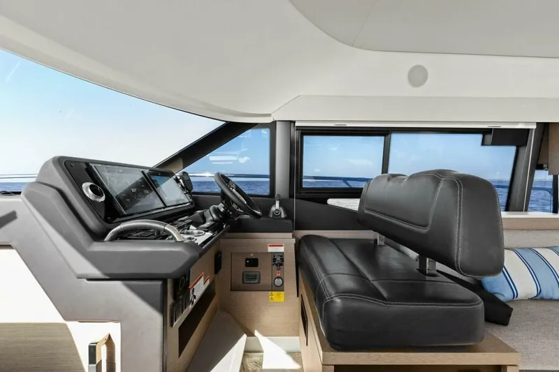 Brace Yourself Too Yacht Photos Pics Interior of 2022 Prestige 460 yacht, featuring modern helm and leather seating.