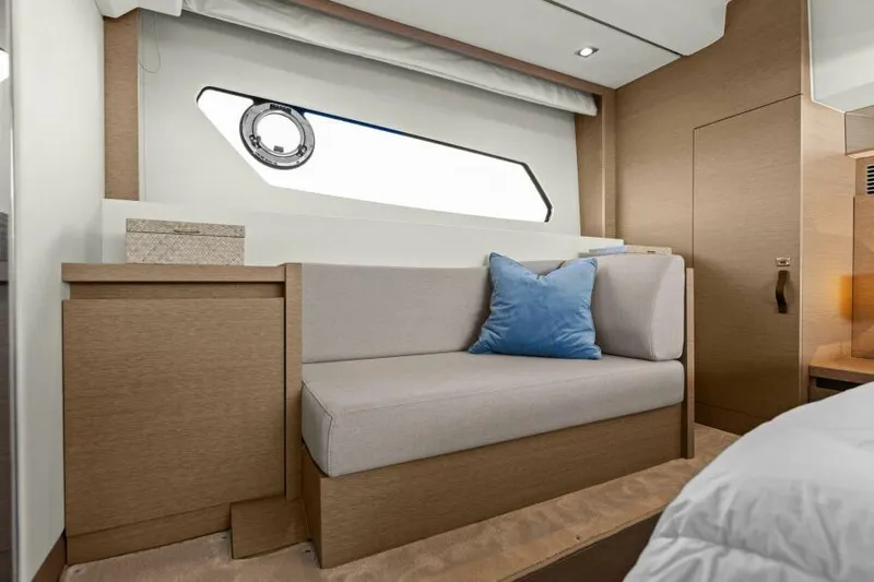 Brace Yourself Too Yacht Photos Pics Luxurious interior of 2022 Prestige 460 yacht with modern seating and elegant decor.