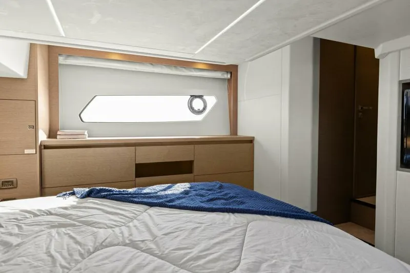 Brace Yourself Too Yacht Photos Pics Luxurious cabin interior of 2022 Prestige 460 yacht with modern furnishings.