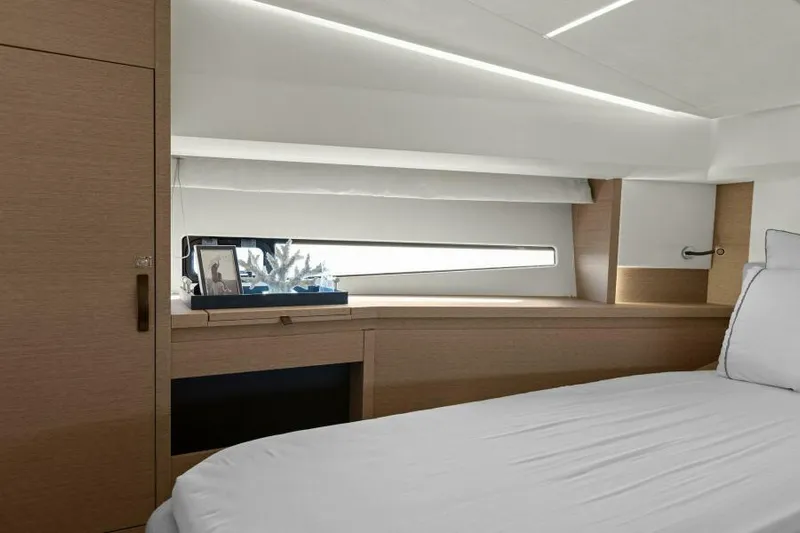 Brace Yourself Too Yacht Photos Pics Luxurious cabin interior of 2022 Prestige 460 yacht with modern design and natural light.