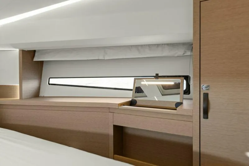 Brace Yourself Too Yacht Photos Pics Luxurious interior of 2022 Prestige 460 yacht with sleek wood finish and modern design.