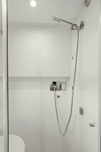 Brace Yourself Too Yacht Photos Pics Modern shower in 2022 Prestige 460 yacht bathroom, featuring sleek design and chrome fixtures.