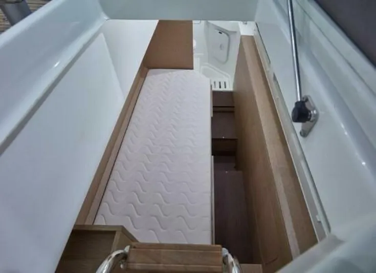 Brace Yourself Too Yacht Photos Pics Interior cabin of 2022 Prestige 460 yacht with a white mattress.