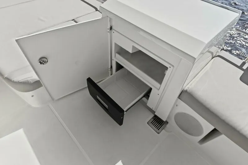 Brace Yourself Too Yacht Photos Pics Open storage compartment on 2022 Prestige 460 yacht deck.