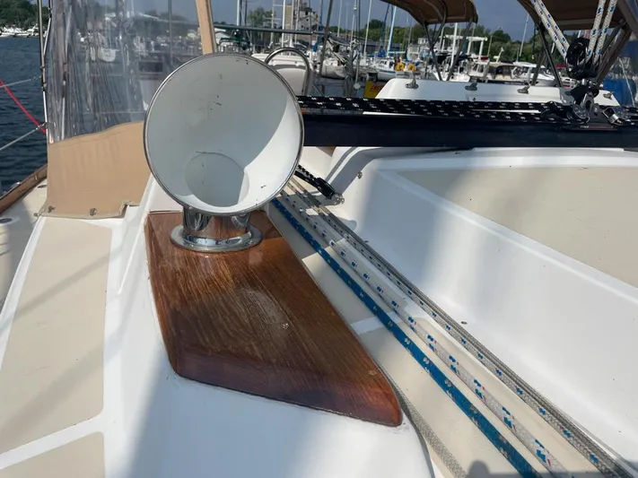 Bell Canto Yacht Photos Pics Sailboat deck with winch and ropes, Tartan 3400, 2006 model, docked in marina.