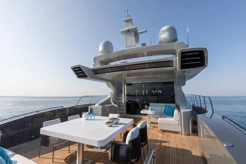 Nana I Yacht Photos Pics Luxurious 2020 Mangusta 110 Open yacht with elegant outdoor seating and ocean view.