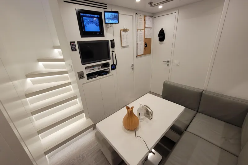 Nana I Yacht Photos Pics Luxurious interior of 2020 Mangusta 110 Open yacht with modern seating and technology.