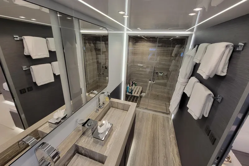 Nana I Yacht Photos Pics Luxurious bathroom in 2020 Mangusta 110 Open yacht with modern fixtures and elegant design.