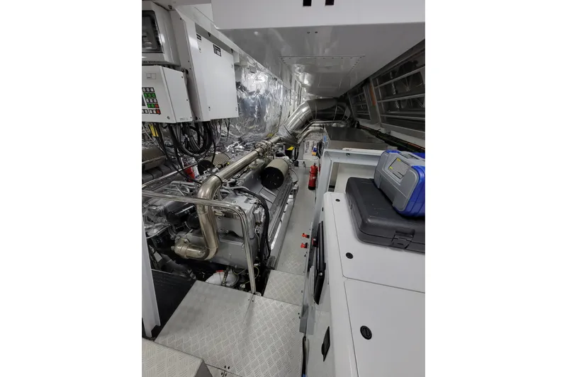 Nana I Yacht Photos Pics Engine room of 2020 Mangusta 110 Open yacht, featuring advanced machinery and equipment.