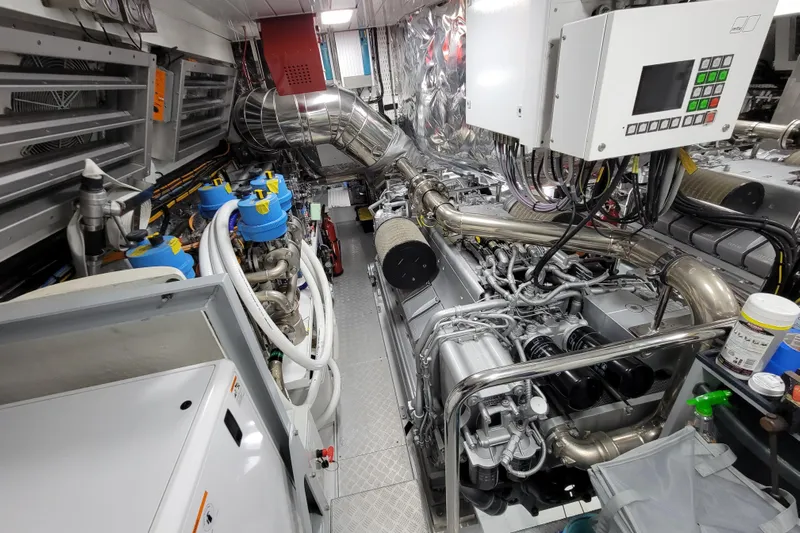 Nana I Yacht Photos Pics Engine room of a 2020 Mangusta 110 Open yacht, showcasing complex machinery and control systems.
