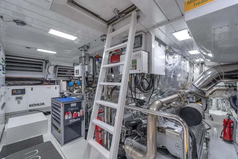 Nana I Yacht Photos Pics Engine room of 2020 Mangusta 110 Open yacht with Kohler generator and equipment.
