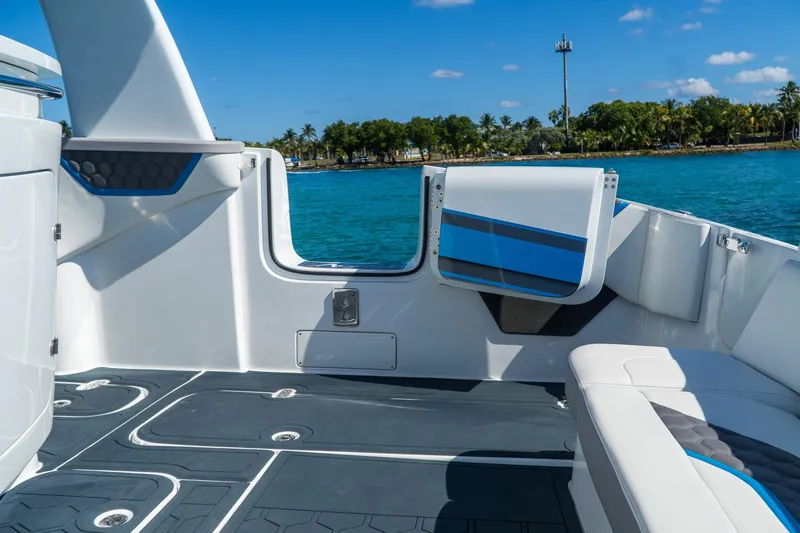  Yacht Photos Pics Luxurious MTI 50v boat interior, 2023 model, featuring sleek seating and ocean view.