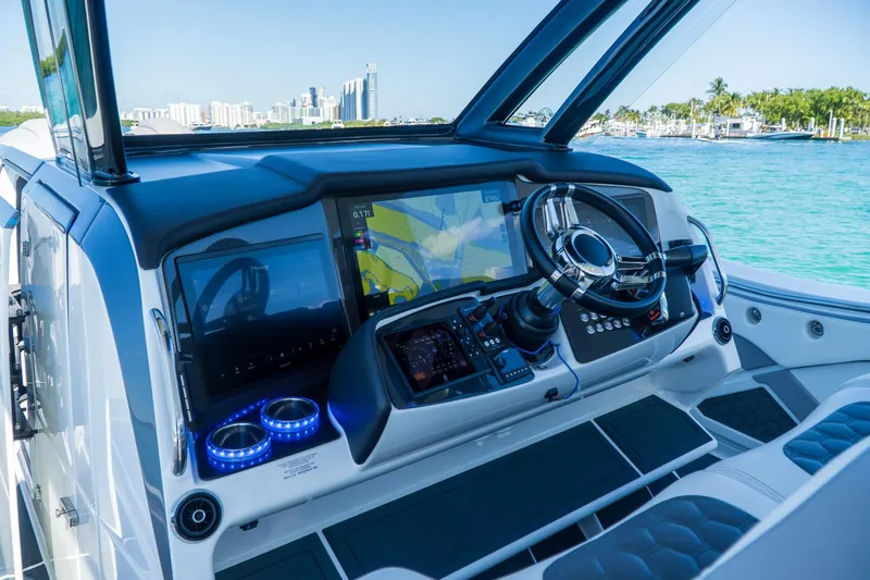  Yacht Photos Pics Cockpit of 2023 MTI 50v boat with advanced navigation system and luxurious design.