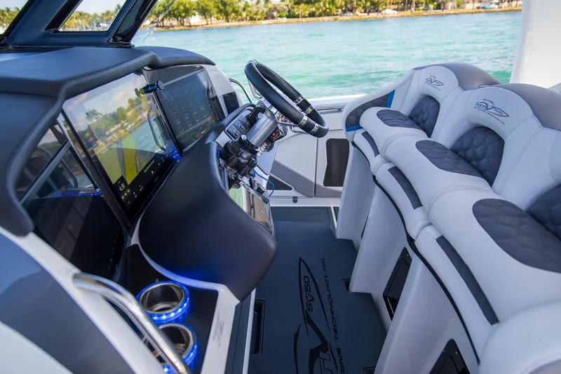 Yacht Photos Pics Interior of 2023 MTI 50v boat with advanced navigation system and luxury seating.