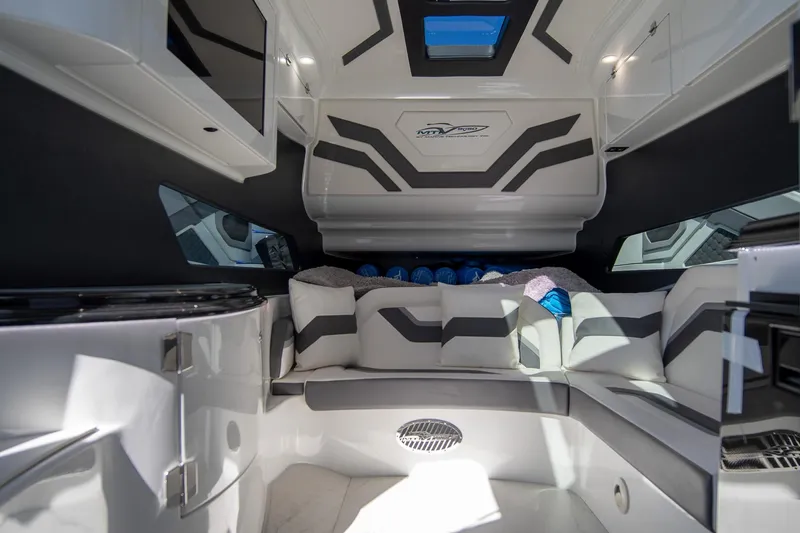  Yacht Photos Pics Luxurious interior of 2023 MTI 50v boat with modern design and comfortable seating.