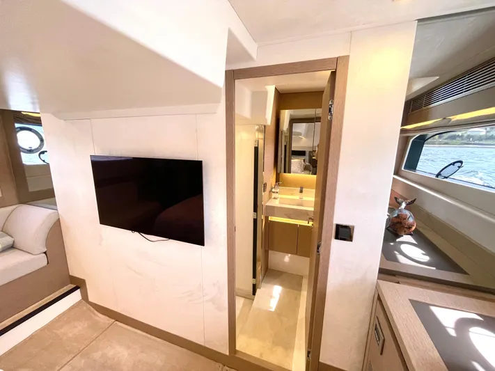 M.y. Blu Dayz Yacht Photos Pics Luxurious interior of 2023 Prestige 520 yacht featuring modern design and elegant furnishings.