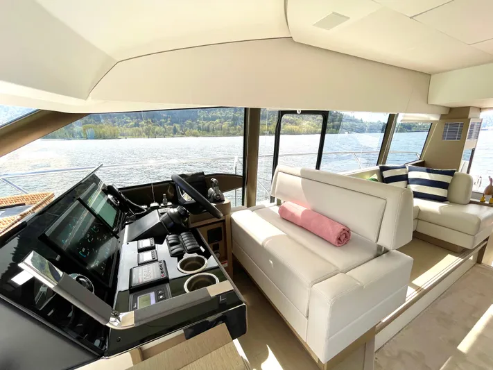 M.y. Blu Dayz Yacht Photos Pics Luxurious interior of 2023 Prestige 520 yacht with scenic water view.