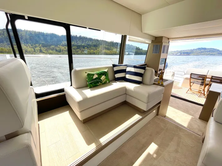 M.y. Blu Dayz Yacht Photos Pics Luxurious interior of 2023 Prestige 520 yacht with scenic water view.