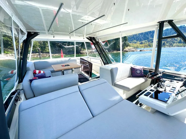 M.y. Blu Dayz Yacht Photos Pics Luxurious interior of 2023 Prestige 520 yacht with scenic water view.