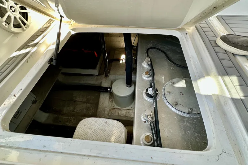  Yacht Photos Pics 2024 NX 360 Sport Coupe engine compartment with visible components and wiring.