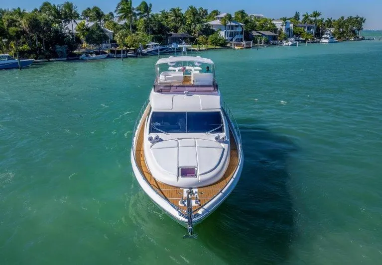 Hope Yacht Photos Pics 2011 Ferretti Yachts 660 cruising in a scenic tropical waterway.