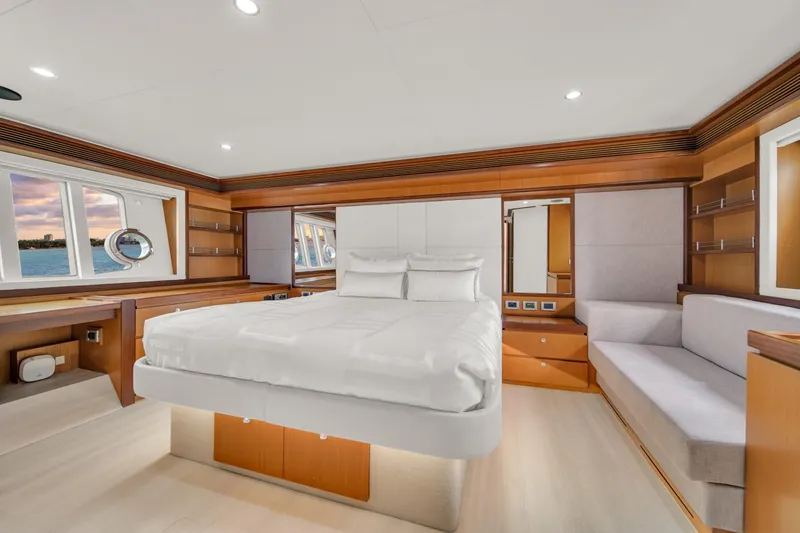 Hope Yacht Photos Pics Luxurious bedroom interior of 2011 Ferretti Yachts 660 with modern design and ocean view.
