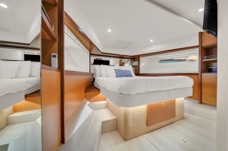 Hope Yacht Photos Pics Luxurious bedroom interior of 2011 Ferretti Yachts 660 with modern design and ambient lighting.
