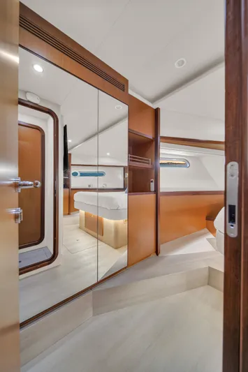 Hope Yacht Photos Pics Luxurious interior of 2011 Ferretti Yachts 660, featuring elegant wood finishes and modern design.