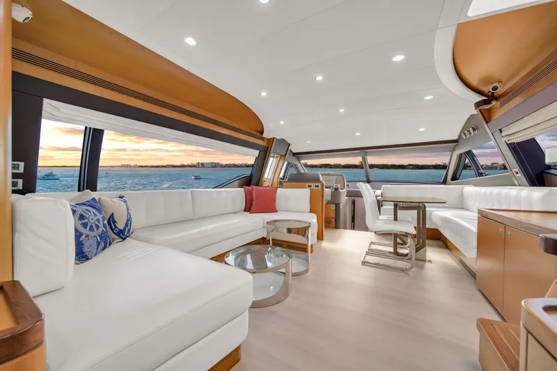 Hope Yacht Photos Pics Luxurious interior of 2011 Ferretti Yachts 660 with elegant seating and panoramic windows.