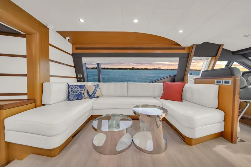 Hope Yacht Photos Pics Luxurious 2011 Ferretti Yachts 660 interior with white seating and ocean view.