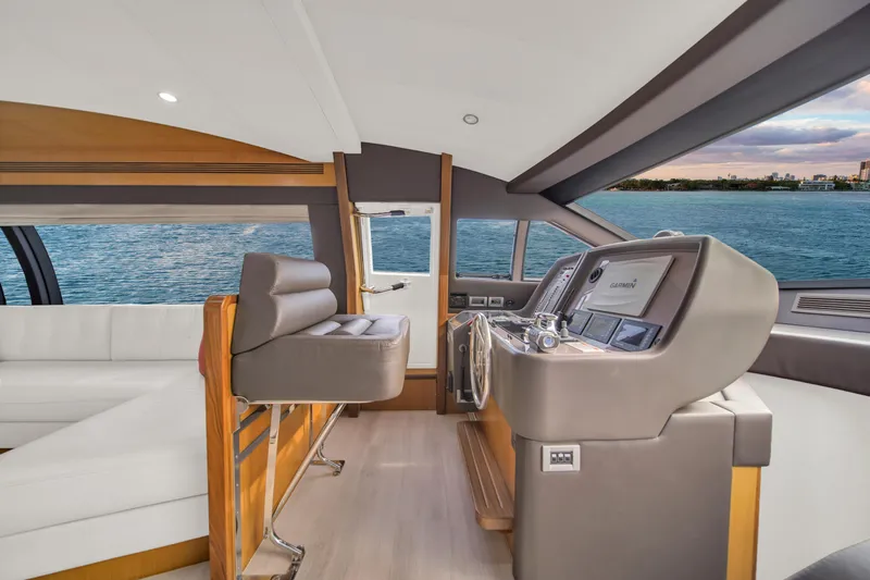 Hope Yacht Photos Pics Interior of 2011 Ferretti Yachts 660, featuring modern helm and luxurious seating.