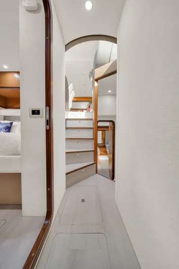 Hope Yacht Photos Pics Interior hallway of 2011 Ferretti Yachts 660, featuring modern design and wooden accents.