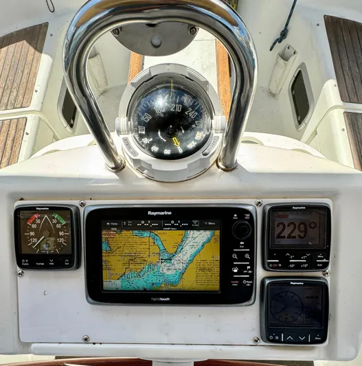 Morning Dance Yacht Photos Pics Beneteau 461 2000 sailboat cockpit with navigation instruments and compass.