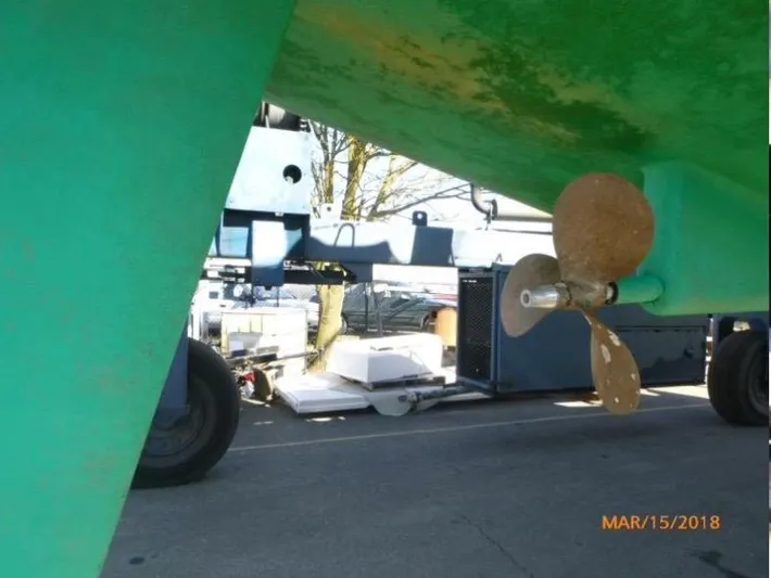 Morning Dance Yacht Photos Pics Beneteau 461 sailboat propeller and hull, 2000 model, on trailer for maintenance.