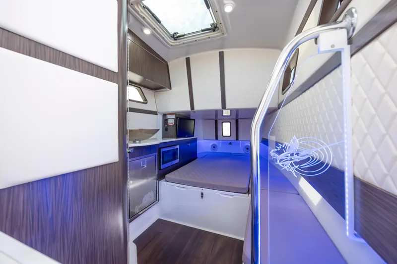  Yacht Photos Pics Luxurious interior of 2021 Edgewater 370CC boat with modern amenities and stylish design.