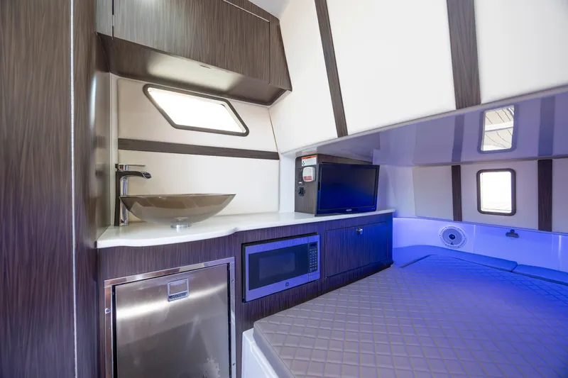  Yacht Photos Pics Luxurious interior of 2021 Edgewater 370CC boat with modern amenities and sleek design.