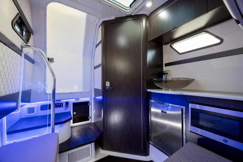  Yacht Photos Pics Luxurious interior of 2021 Edgewater 370CC boat with modern amenities and sleek design.