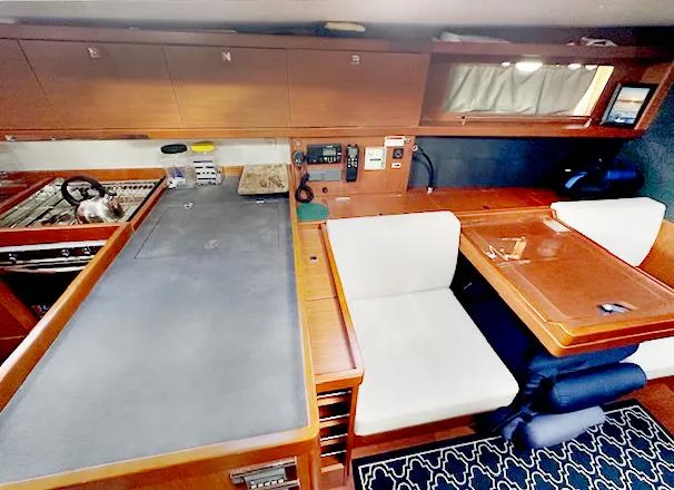 Journey Yacht Photos Pics Interior of 2019 Beneteau Oceanis 48 yacht with modern kitchen and dining area.