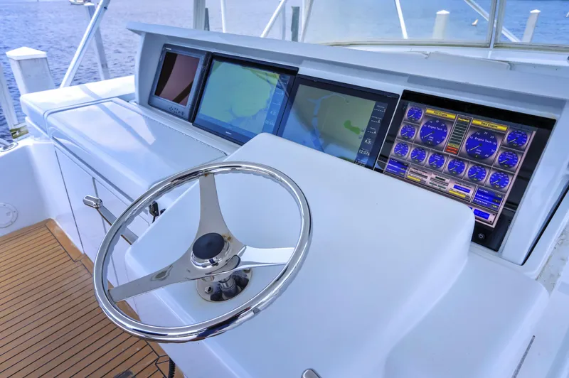  Yacht Photos Pics Helm of 2007 Hatteras 68 Convertible yacht with advanced navigation displays.