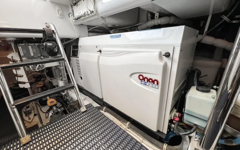  Yacht Photos Pics Engine room of 2007 Hatteras 68 Convertible yacht with Onan generator.