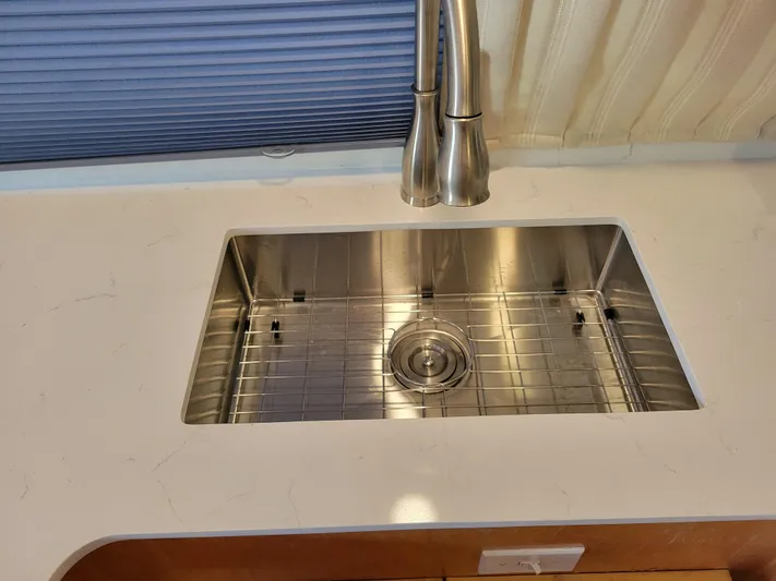  Yacht Photos Pics Stainless steel sink with modern faucet in Navigator 5000 Classic, 1997 model.