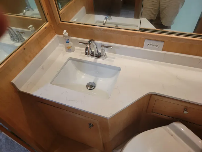  Yacht Photos Pics Bathroom sink with marble countertop in 1997 Navigator 5000 Classic yacht.